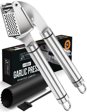 Orblue garlic press stainless-steel body in action for quick minced garlic.