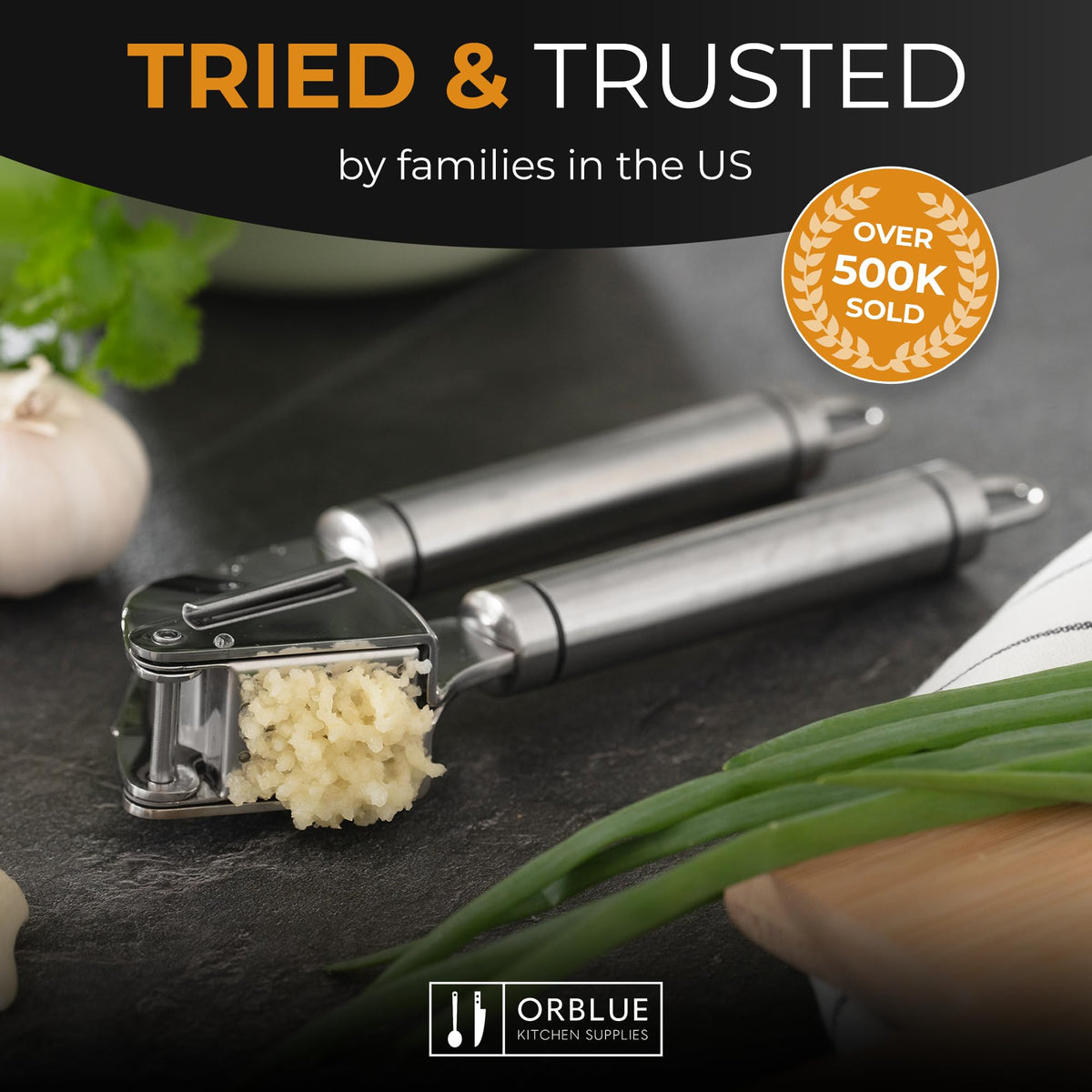 Orblue silicone-peeler included for quick garlic skin removal.