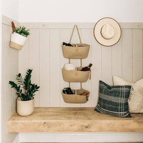 OrganiHaus doorway storage solution for living room clutter.