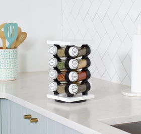Clear glass jars display spices and stay visible.