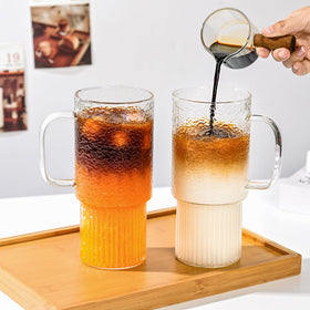 Oroklis glass mug with wide mouth for easy cleaning and filling.