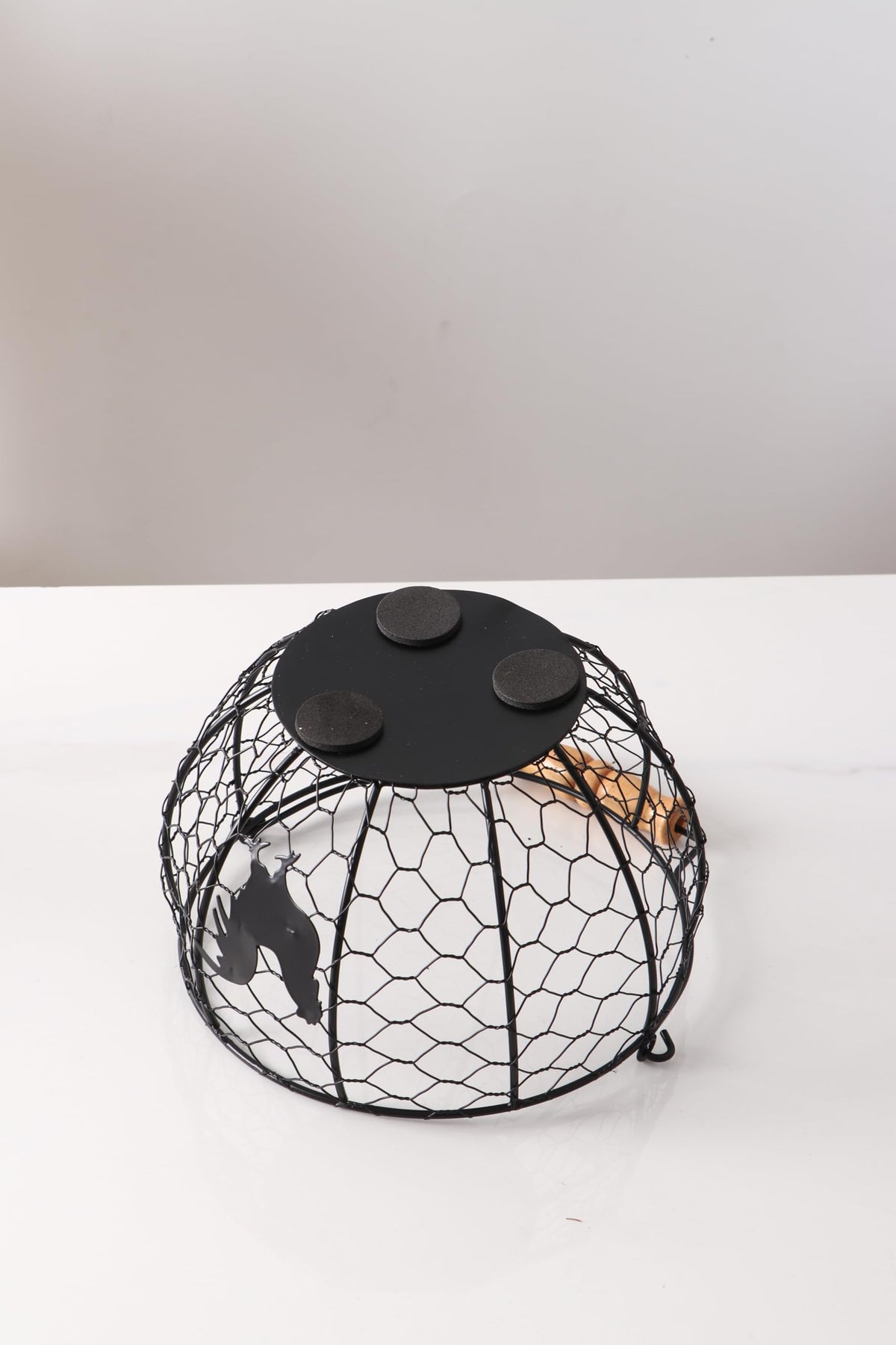 Oskas Countertop Kitchen Storage Bin doubles as egg and fruit storage.