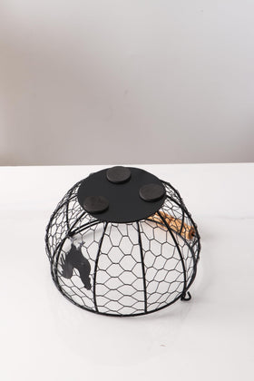 Oskas Countertop Kitchen Storage Bin doubles as egg and fruit storage.