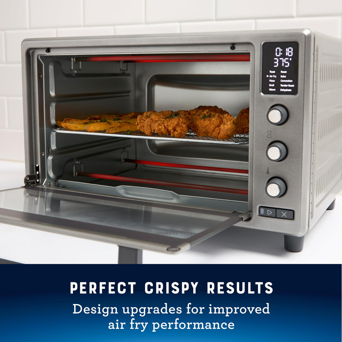 Oster 10 Function Air Fryer Oven interior view highlights roomy 26 qt space for larger dishes.