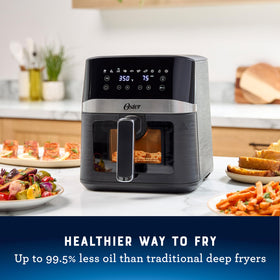 Oster Compact Air Fryer interior light enhances visibility during cooking.