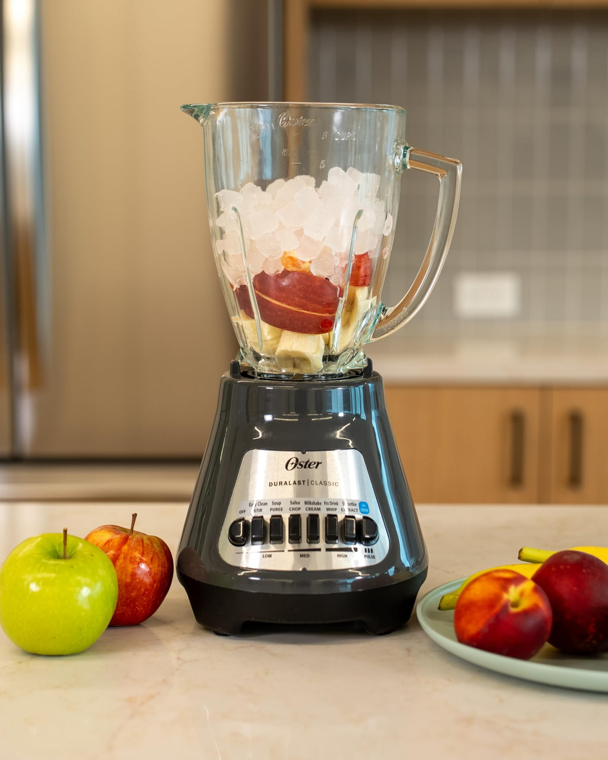 Oster ice crushing button powers quick crushed-ice for smoothies.