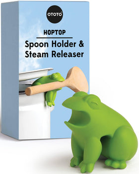 OTOTO HopTop frog spoon holder on stovetop keeps utensils off the counter.