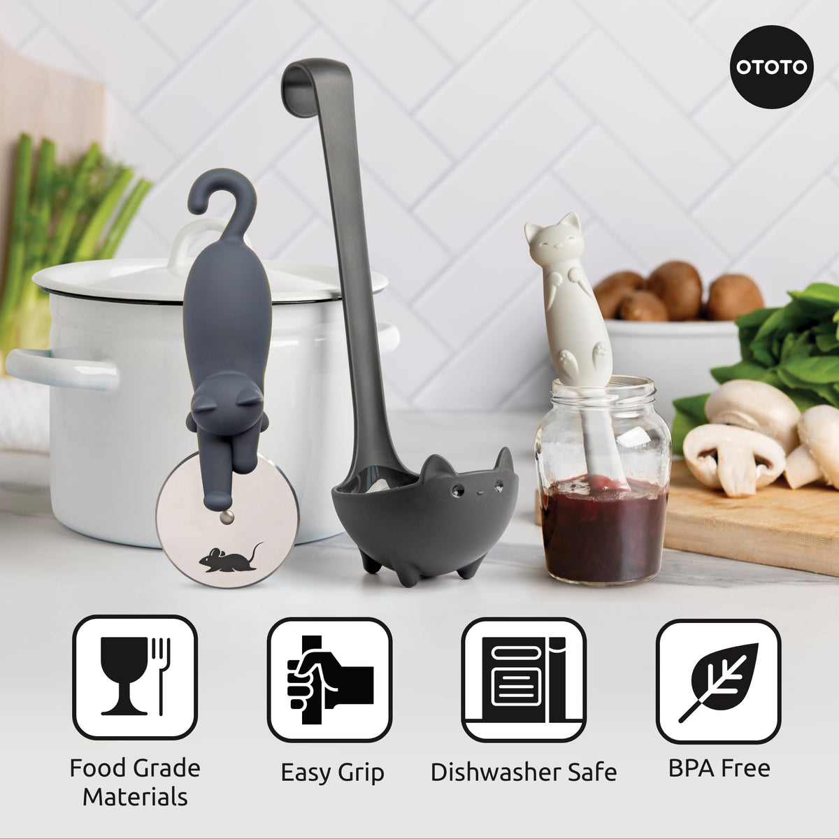 OTOTO Muscateers Kitty Cut pizza cutter in use for pizza night.