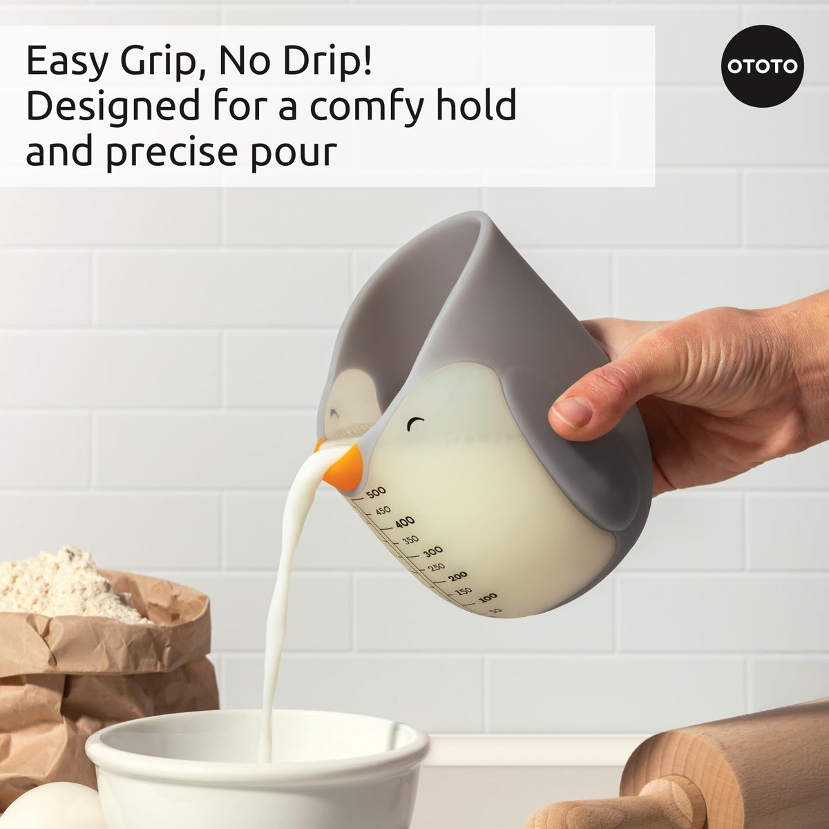 OTOTO Penny Penguin measuring cups with precise pour spout for clean flow