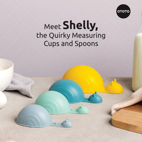 OTOTO Shelly measuring cups and spoons stack for space-saving storage.