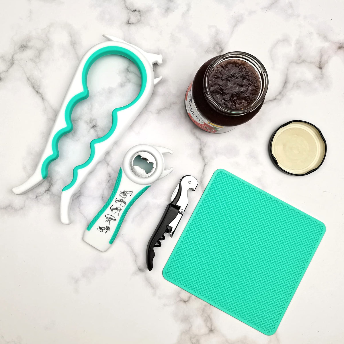 Otstar mouth-shaped lid opener provides leverage to loosen large lids.