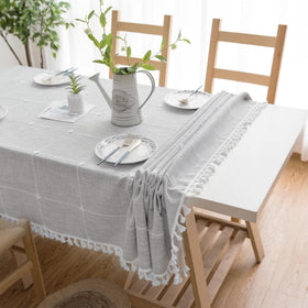 Oubonun grey tassel detail tablecloth adds subtle charm to gatherings