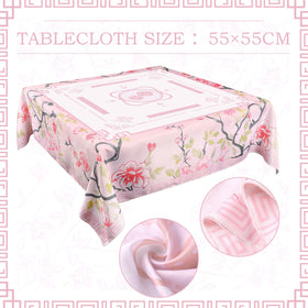 Oudain chinoiserie tablecloth close-up shows pink-green florals for elegant game nights.