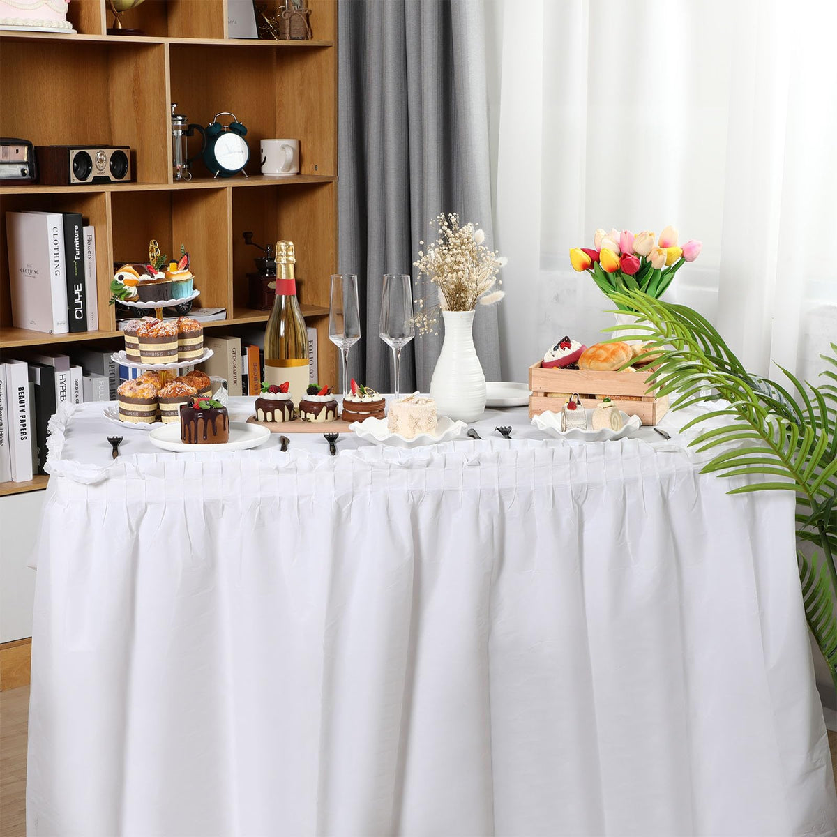 Oudain white table setup for weddings and celebrations with spill-friendly disposable decor
