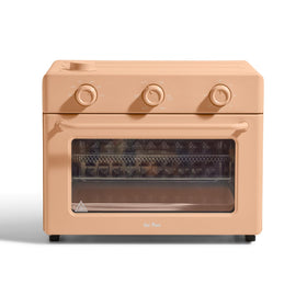 Our Place Large Wonder Oven front view highlights its spacious capacity for family meals.