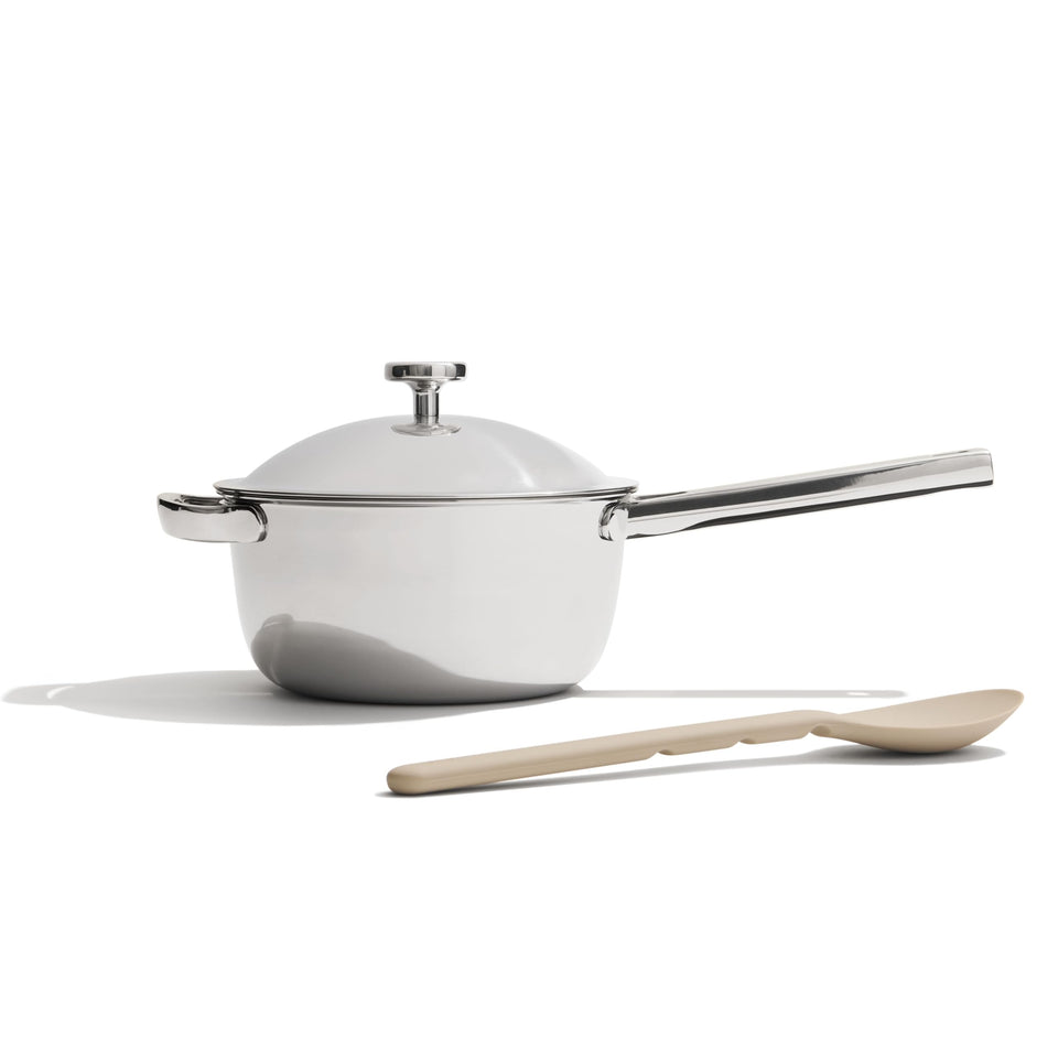 Our Place Mini Titanium Perfect Pot Pro with lid on, ideal for simmering sauces.