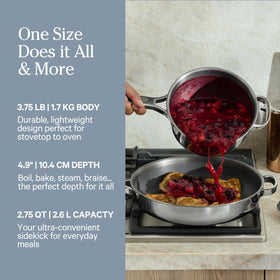 Our Place Mini Titanium Perfect Pot Pro with silicone spoon, designed for easy cleanup.