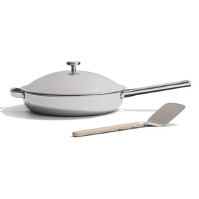 Our Place Titanium Always Pan Pro top view highlights sleek design and comfortable grip.