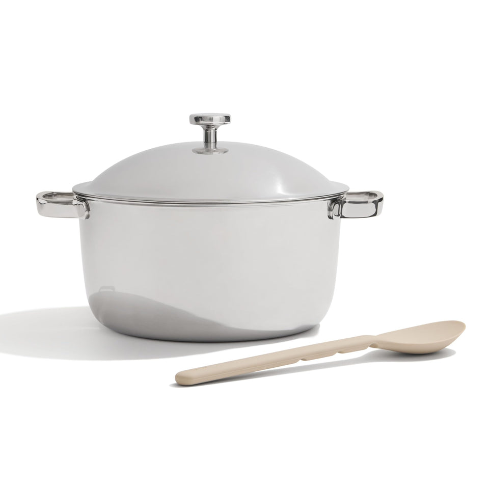 Our Place Titanium Perfect Pot Pro with lid shows a sturdy stock pot for stove-to-oven use.