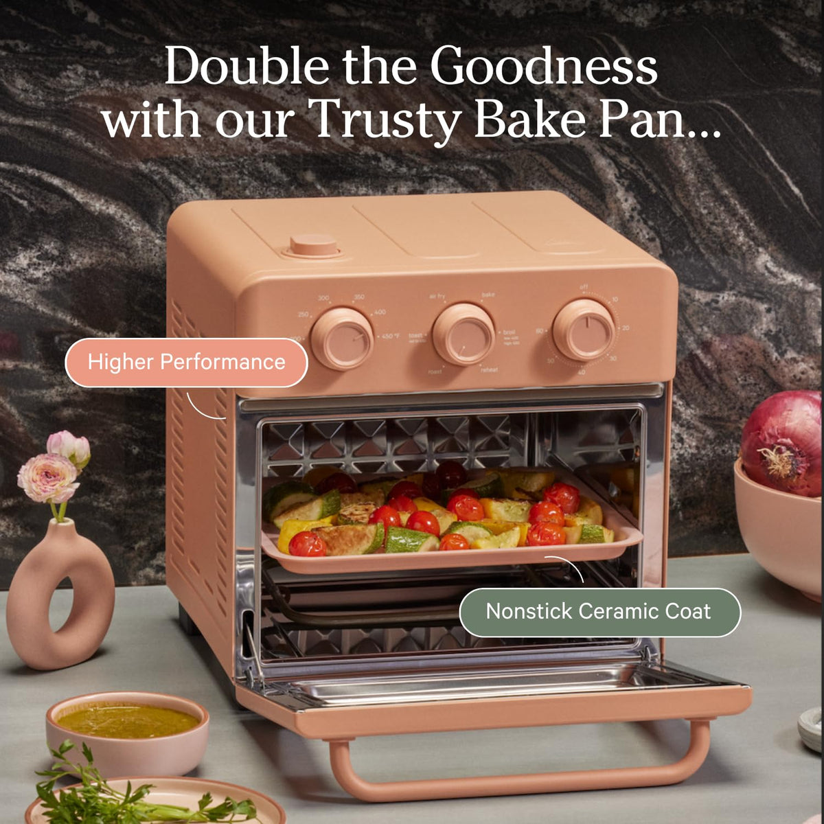 Our Place Wonder Oven Bake Pan and Air Fryer Basket built to handle up to 450°F for versatile cooking.