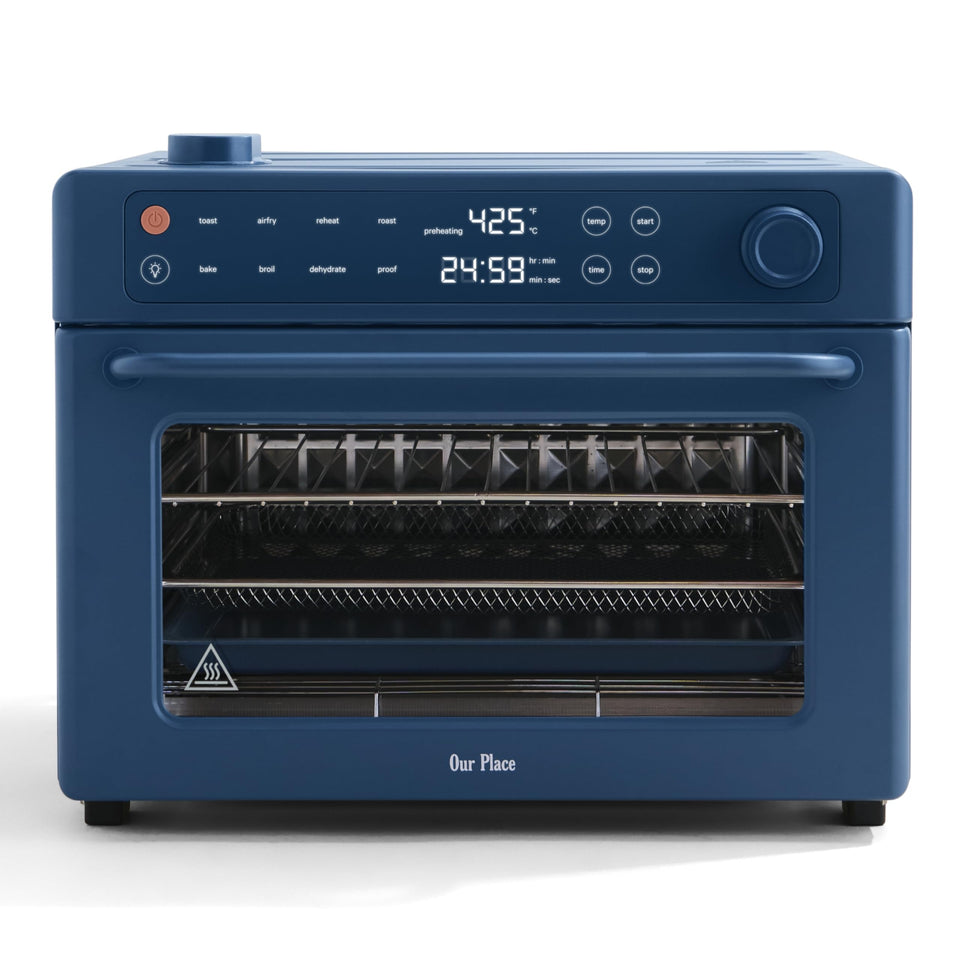 Our Place Wonder Oven Pro front view with blue salt finish and intuitive touchscreen control.