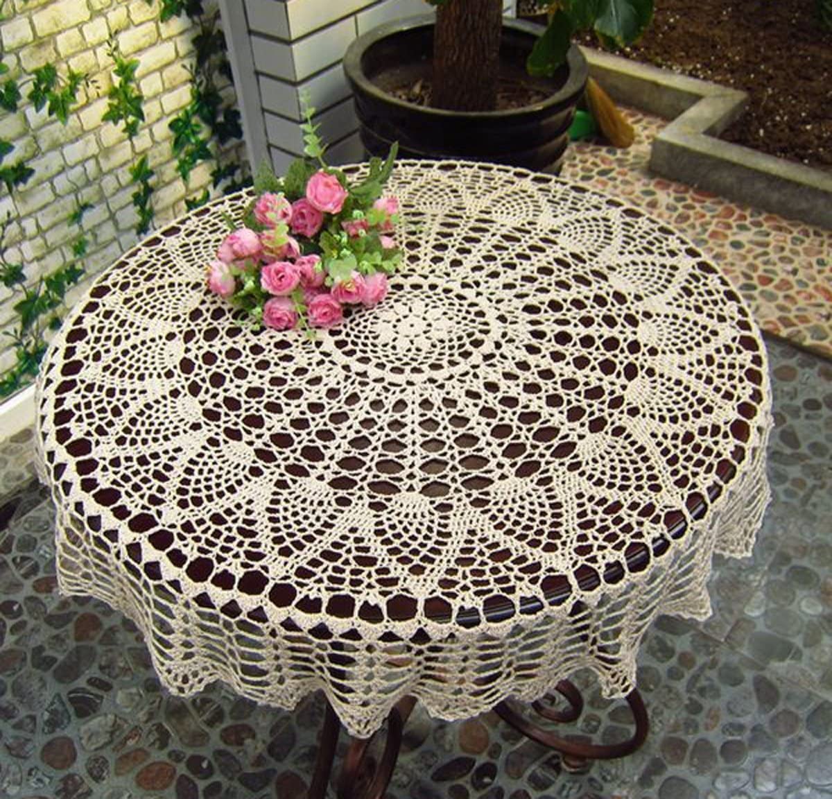 Ourhommie vintage crochet tablecloth with sunflower motif enhances rustic dining ambiance.
