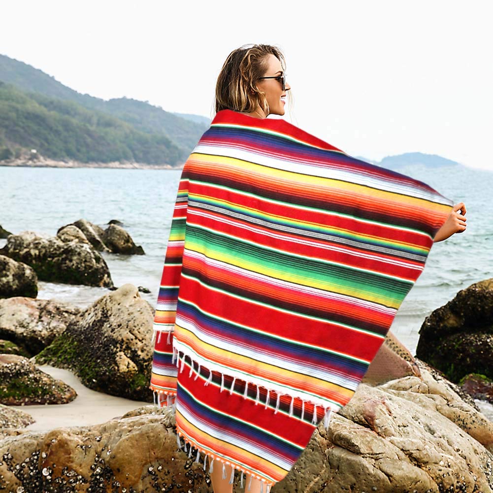 OurWarm blanket used as bedspread and wall tapestry for versatile decor.