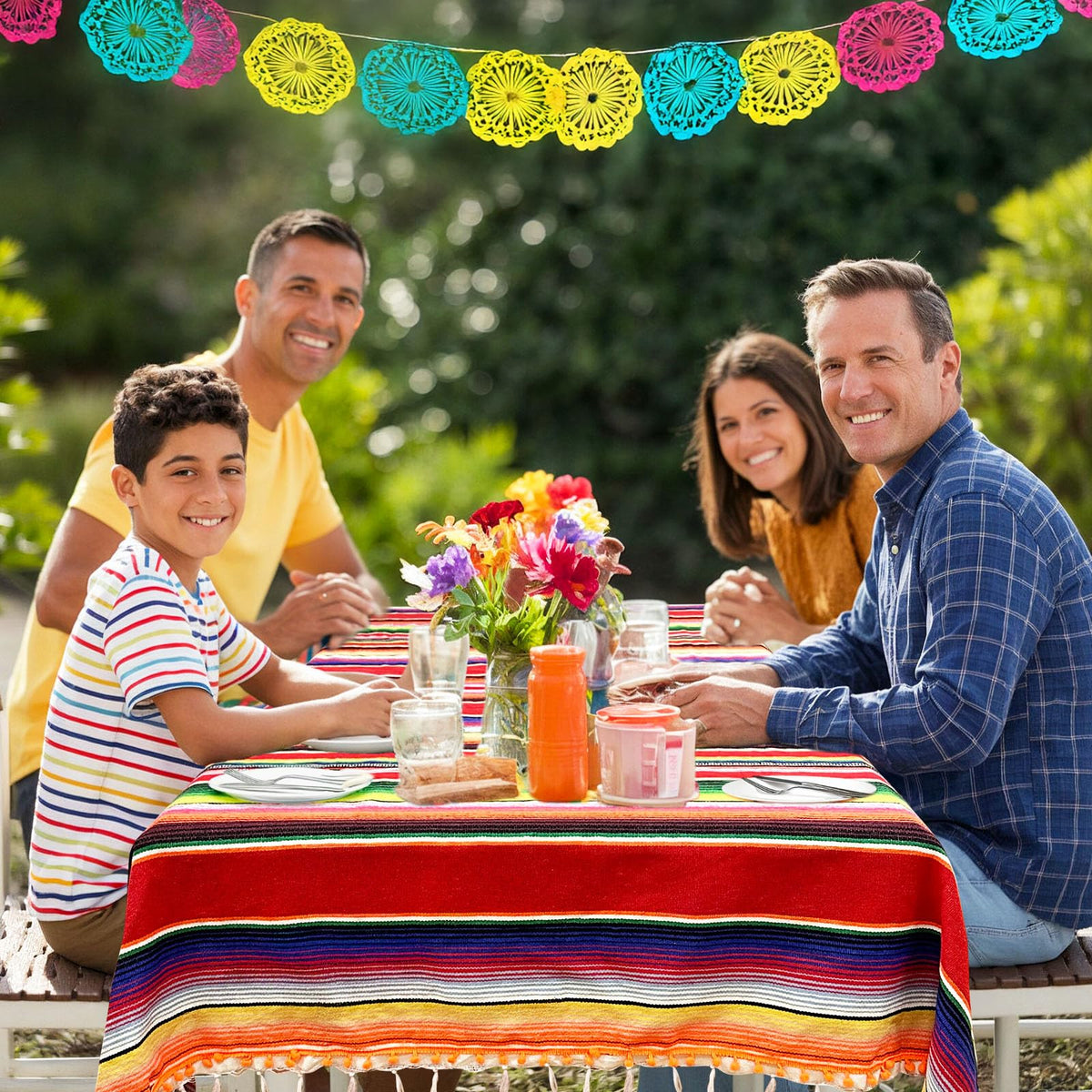 OurWarm tablecloth showcased as multiuse decor in a lively dining setup.