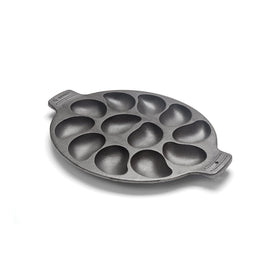 Outset cast iron oyster grill pan with 12 cavities for easy, even seafood grilling.