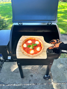 Outset bamboo pizza peel doubles as a stylish charcuterie serving board.