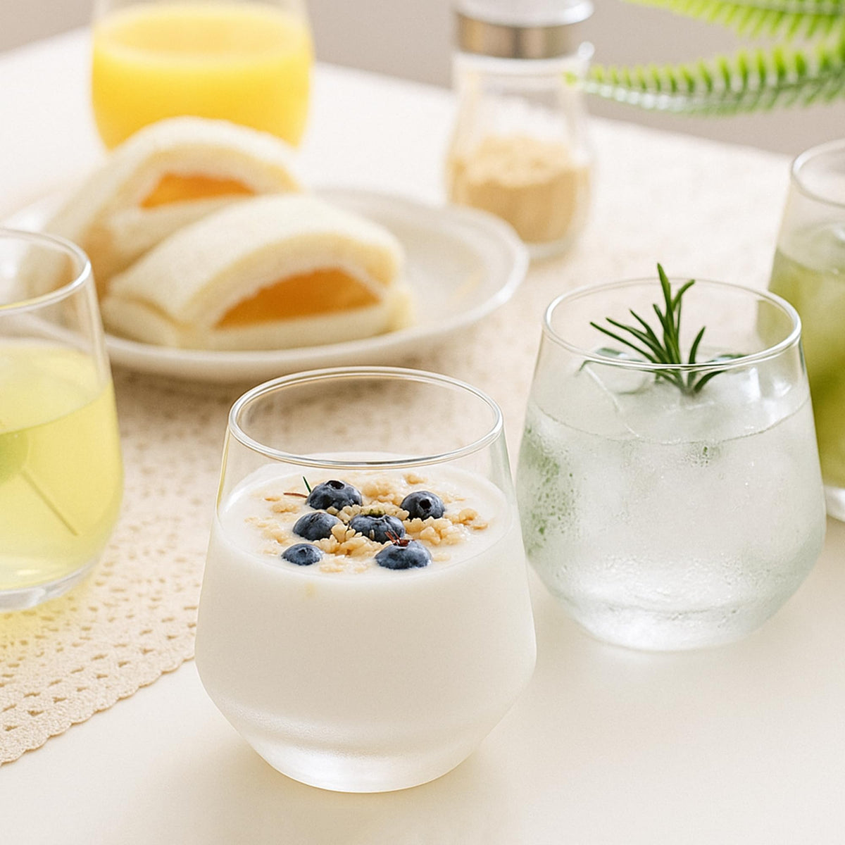OUWO stemless wine glasses arranged on a party table for elegant entertaining.