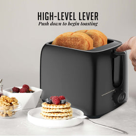 OVENTE TP2210B high-lift lever aids safe slice removal.