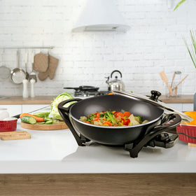 OVENTE dishwasher-safe lid simplifies post-cook cleanup for busy kitchens.