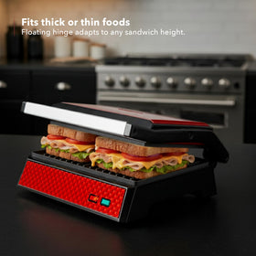 Removable drip tray on OVENTE GP0620R keeps counters tidy after grilling.