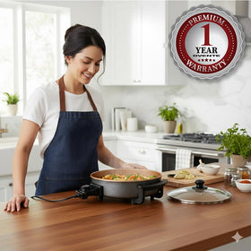 OVENTE skillet ready for family meals on a busy kitchen counter