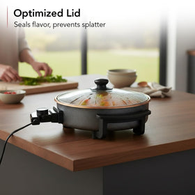 Close-up of the temperature control dial on the OVENTE skillet
