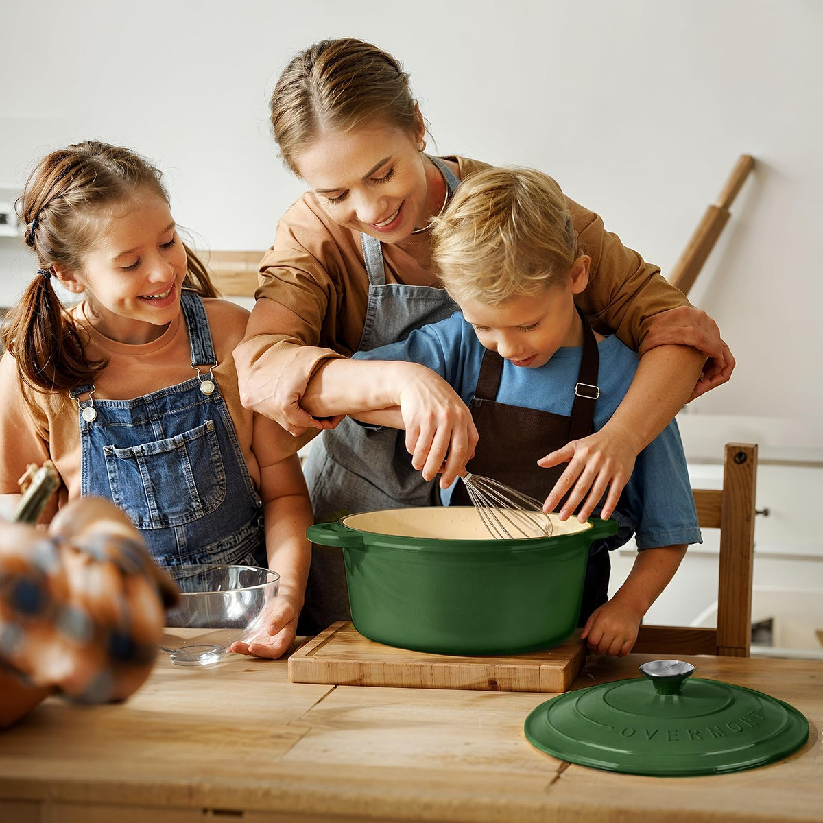 Induction-ready Overmont Dutch oven shown on modern stove for versatility.