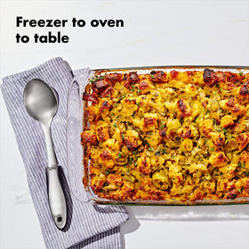 OXO 9x13 baking dish with wide handles for a secure grip.
