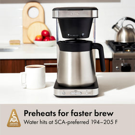 Under-cabinet friendly design demonstrates space-saving coffee maker for small kitchens.