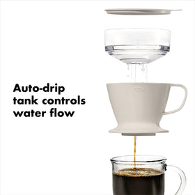 Auto-drip tank controlling water flow for balanced extraction
