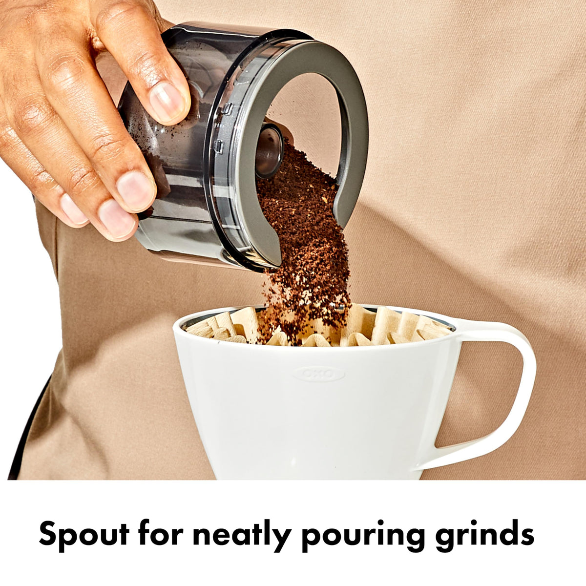 OXO chuteless design simplifies access and cleaning of the grinder.