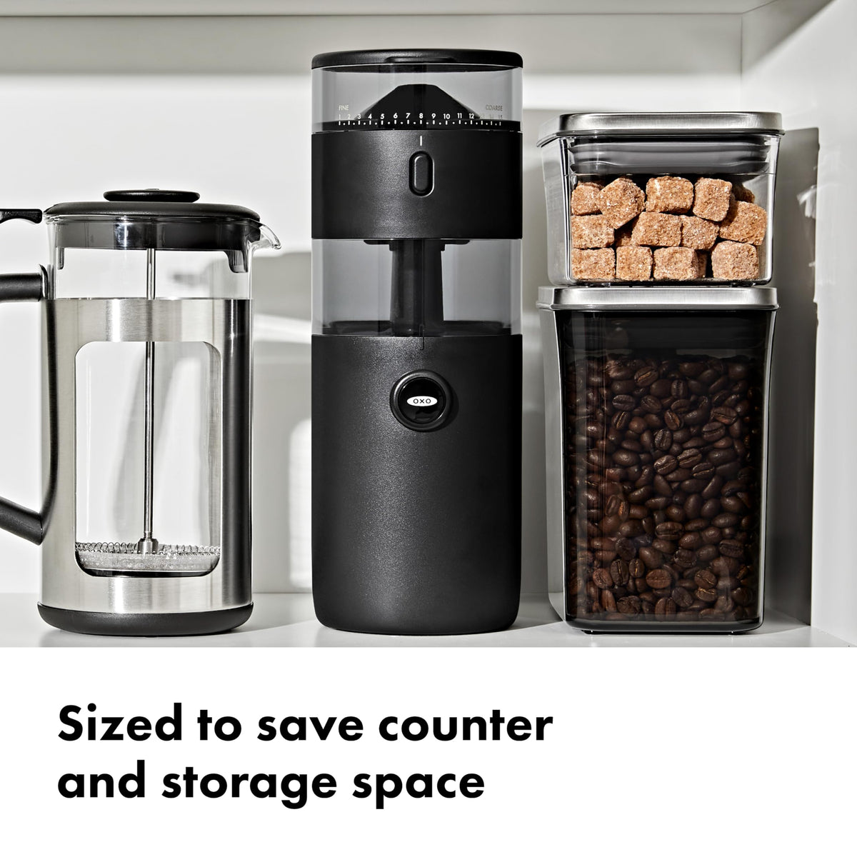 OXO Brew grinder shows stainless steel conical burrs for consistent texture.