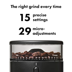 OXO Brew grounds container with integrated spout for neat pouring.