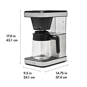 Mug riser reduces drips and fits under cabinets.