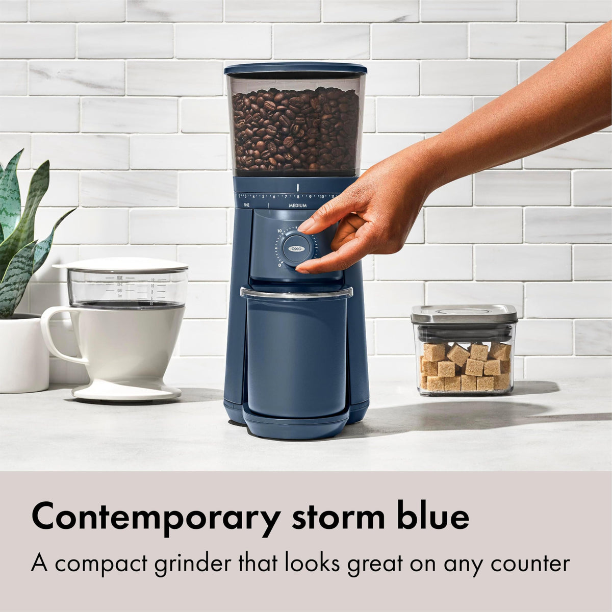 OXO Brew static-fighting container reduces cling for clean transfers.