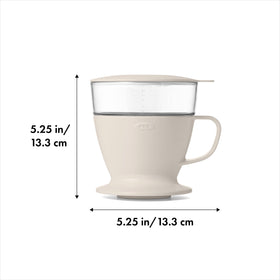Water tank with measurement marks showing up to 12 oz for precise brews