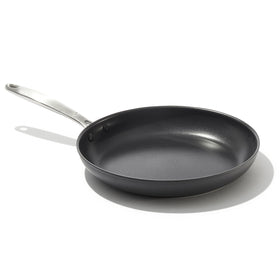 OXO Enhanced 12-inch frying pan top view shows diamond-reinforced ceramic coating for easy food release.