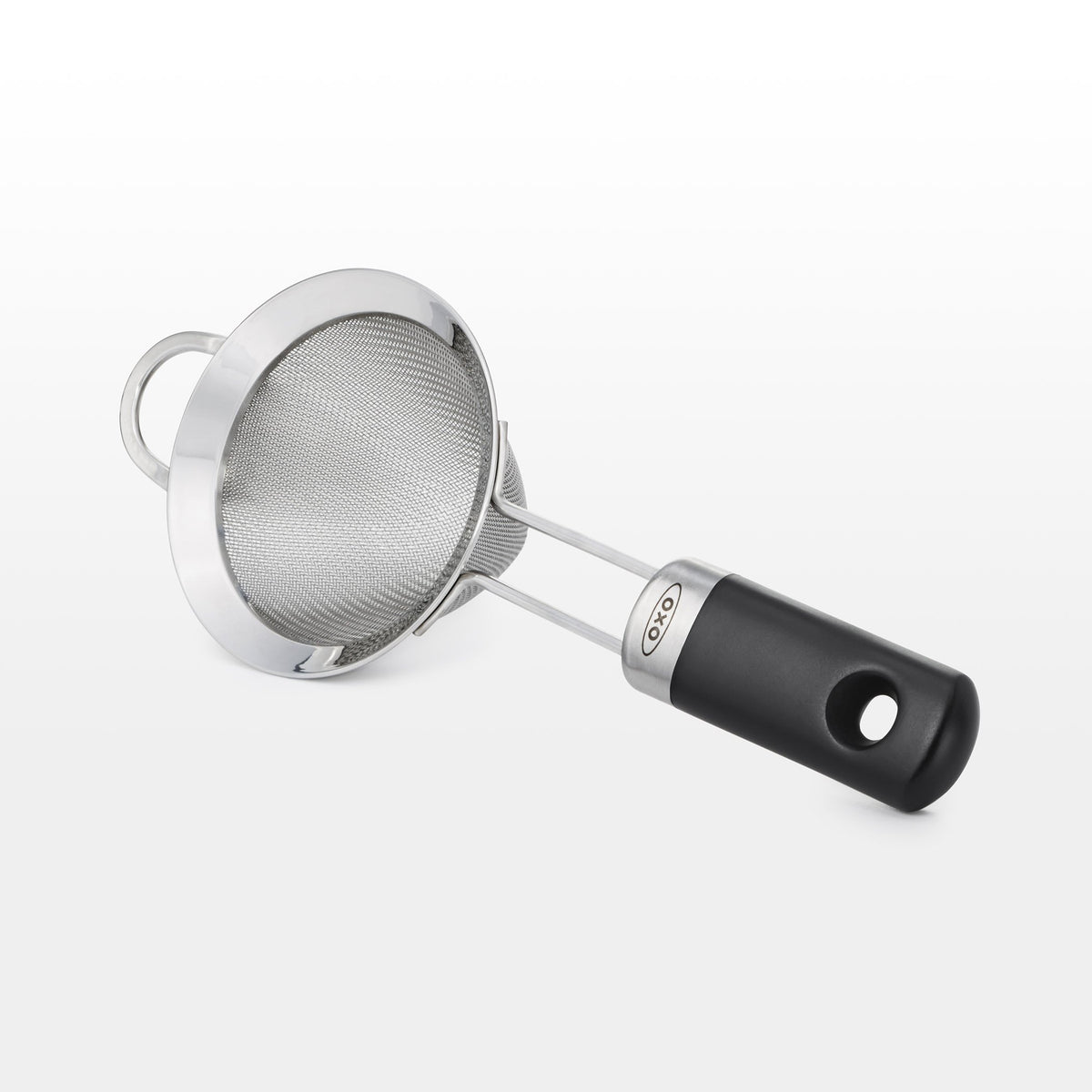 OXO fine mesh cocktail strainer handle close-up highlights soft non-slip grip