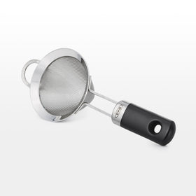 OXO fine mesh cocktail strainer handle close-up highlights soft non-slip grip