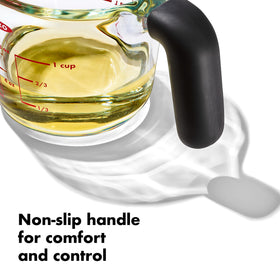 OXO Good Grips 1 Cup Glass Measuring Cup highlights secure non-slip handle for wet cooking.